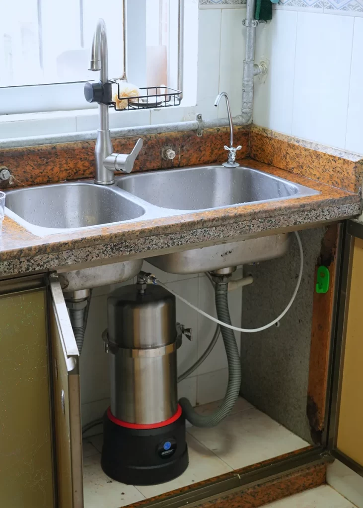 ChengrongTimes stainless steel under sink water filter installed beneath a kitchen sink with a compact design and no drain connection required.
