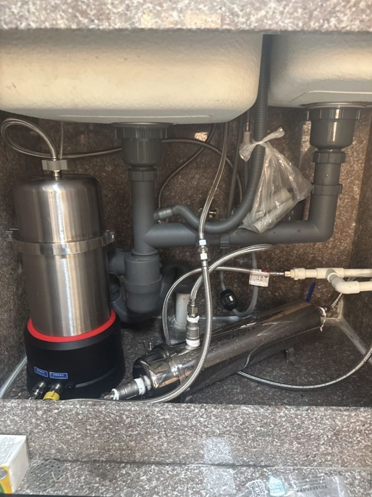 Under sink installation of a 0.1μm stainless steel microfiltration water filter for fine sediment removal and a mineral-retaining drinking water purifier